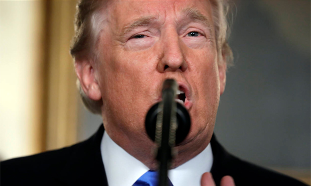President Donald Trump speaks in the Diplomatic Reception Room of the White House, Wednesday, Dec. ...