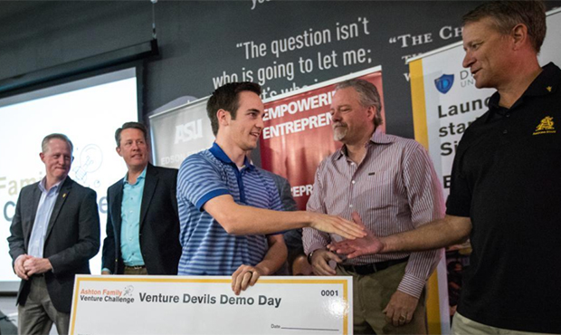 ASU software engineering major Kevin Hale (left) thanks Joe Ashton of the Ashton Family Foundation ...