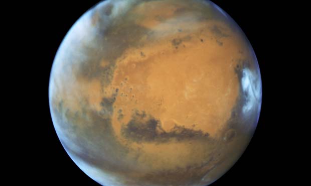 This May 12, 2016 image provided by NASA shows the planet Mars. On Sunday, May 22, 2016, the sun an...