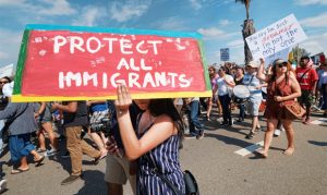 Judge blocks Trump decision to end DACA program for young immigrants