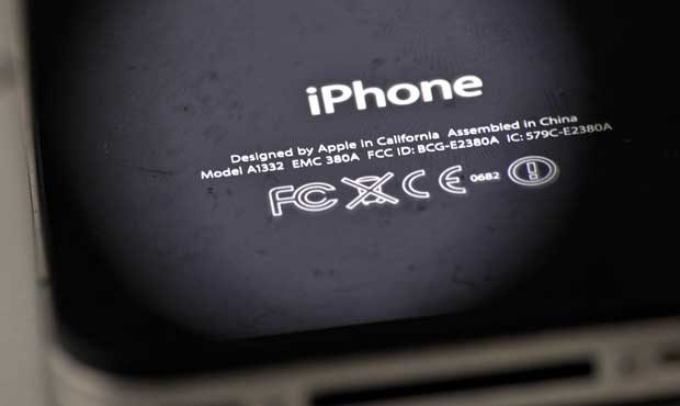 FILE- In this Thursday, Dec. 6, 2012, photo, the back of an iPhone 4 in New York. Apple is apologiz...