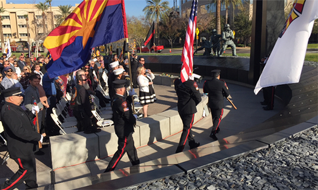 Fallen Firefighters Color Guard marches to the Memorial (KTAR News/Kathy Cline)...