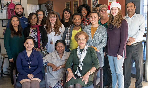 The Catholic Charities team works to place refugee children in foster homes. (Nicole Tyau/Cronkite ...