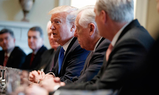 President Donald Trump speaks during a meeting with lawmakers on immigration policy in the Cabinet ...