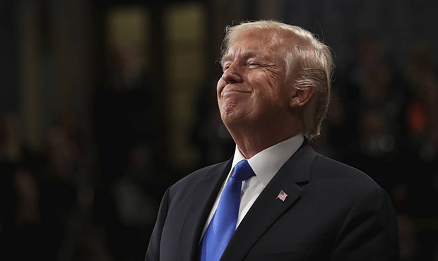 President Donald Trump smiles during State of the Union address in the House chamber of the U.S. Ca...
