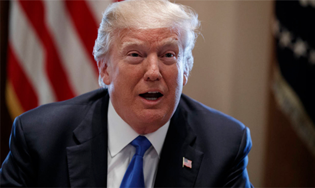 President Donald Trump speaks during a meeting with lawmakers on immigration policy in the Cabinet ...