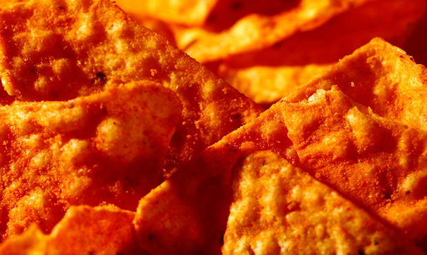 FILE- This Sept. 26, 2014, file photo shows Nacho Cheese flavored Doritos in Philadelphia. Don't ex...