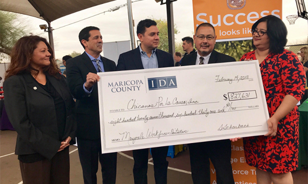 Maricopa County supervisor Steve Gallardo (second to right) presented CPLC a $827,631 check to help...