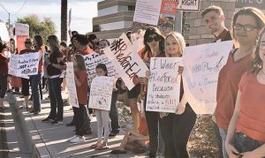 Arizona educators, supporters protest Gov. Doug Ducey's KTAR visit