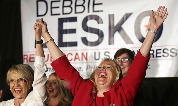 Republican U.S. Congressional candidate Debbie Lesko, right, celebrates her win with former Arizona...