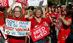 Teachers vote in favor of walkout, risk losing their jobs