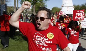 Phoenix-area school district warns staff against wearing Red for Ed shirts