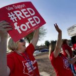 red-protest-april11-ap