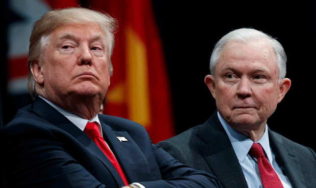 In this Dec. 15, 2017,  photo, President Donald Trump, left, sits with Attorney General Jeff Sessio...