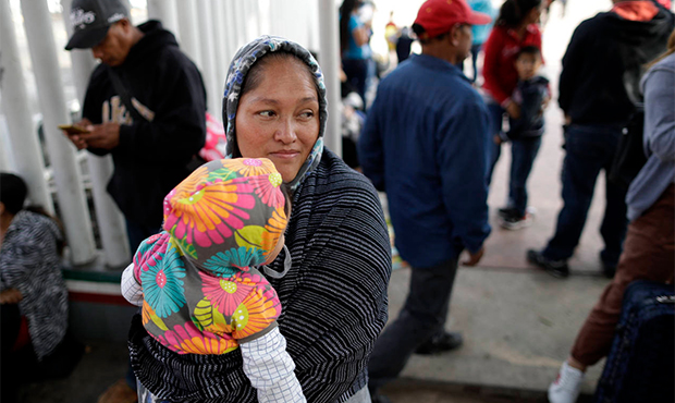 In this June 13, 2018 photo, Maria Rafaela Blancante, of the Mexican state of Michoacan, holds her ...