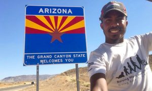 Man mowing lawns for free state by state stops in Arizona