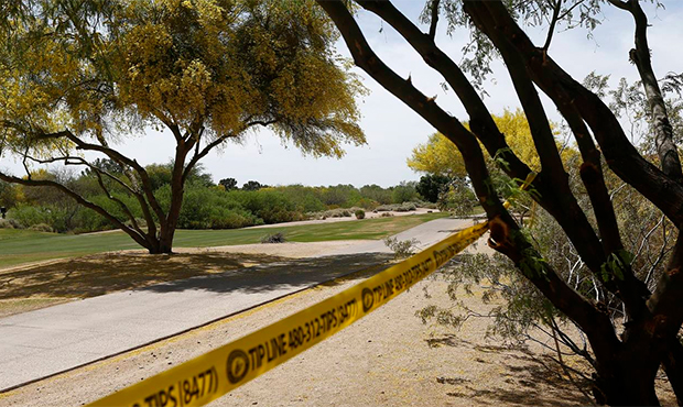 Police tape cordons off an area near the site of a plane crash that killed several people Tuesday, ...