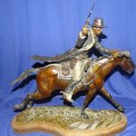 18-2800 Photo Man on horse statue