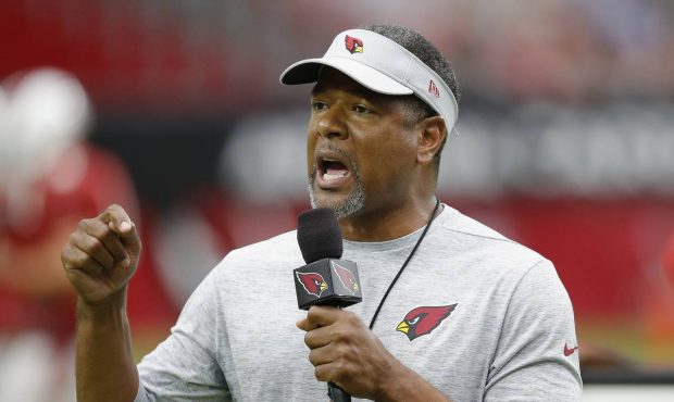Arizona Cardinals head coach Steve Wilks talks to fans prior to an NFL football practice Saturday, ...