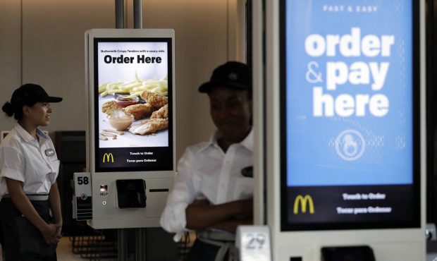 Employees stand in McDonald's Chicago flagship restaurant Wednesday, Aug. 8, 2018. McDonald's unvei...