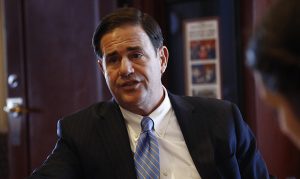Arizona Gov. Ducey faces high-wire act of choosing successor for McCain
