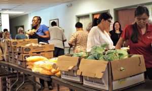 St. Mary's Food Bank loads fridges at low-income Phoenix housing project