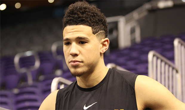 The summer after his freshman high school, now Phoenix Suns star Devin Booker moved to Mississippi ...