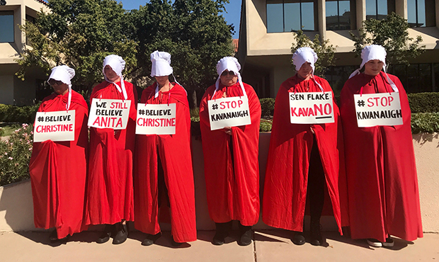 Depicting the television series "Handmaid's Tale" about women being treated as property, several wo...