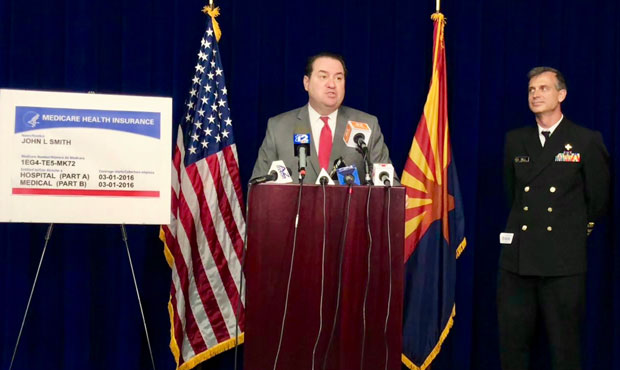 Arizona Attorney General Mark Brnovich, left, and Greg Dill of the U.S. Centers for Medicare & Medi...