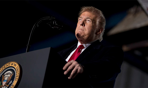 President Donald Trump pauses while speaking at a rally at Southern Illinois Airport in Murphysboro...