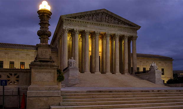 The U. S. Supreme Court building stands quietly before dawn in Washington, Friday, Oct. 5, 2018. Th...