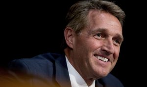 Former Republican Sen. Jeff Flake of Arizona says he won't vote for Trump