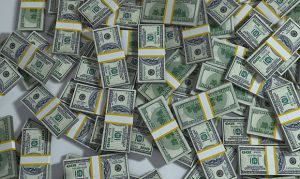 Former Arizona official pleads guilty to taking bribes from debt company