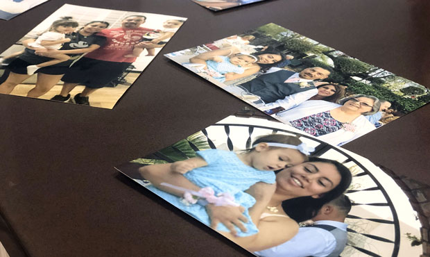 The Garcias show their collection of photos from happier times, including one from Arianna Dodde’...
