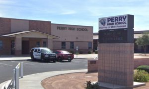 Gilbert police investigating swastikas on signs posted near high school