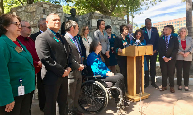 House Minority Leader Charlene Fernandez speak outside the Arizona Capitol on Wednesday, April 3, 2...