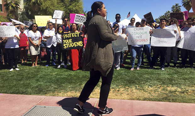 This April 10, 2019, file photo shows supporters of three University of Arizona students who were c...