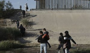 Migrant border apprehensions in May jump to highest in 13 years