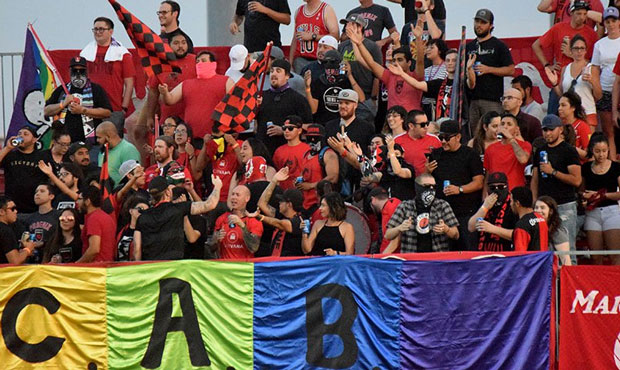 Phoenix Rising FC fans are helping raise money for LGBTQ charities. (Josh Martinez/Cronkite News)...