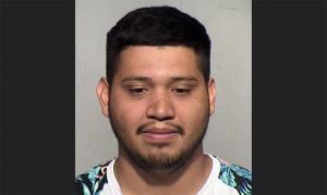 Phoenix man accused of leaving child in car while getting popcorn