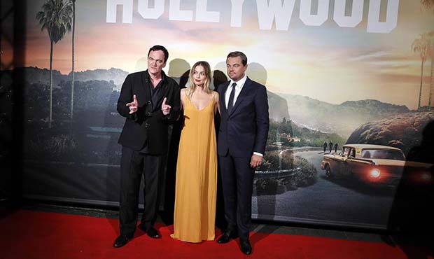 U.S. filmmaker Quentin Tarantino, from left, Australian actress Margot Robbie and U.S. actor Leonar...