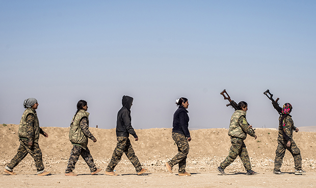 Women in a military council of Kurds, Christians, Arabs, Turkmen, Yazidis and others in northwest S...