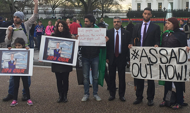 Syrian emigre Zaki Lababidi, center, who now lives in Scottsdale, takes part in an April 2017 prote...