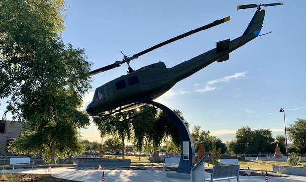 A 1967 Huey helicopter is on display at the Senator John McCain Vietnam Veterans Memorial Plaza in ...