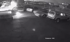 Surveillance video shows arsonist set fire to 5 cars in Phoenix parking lot
