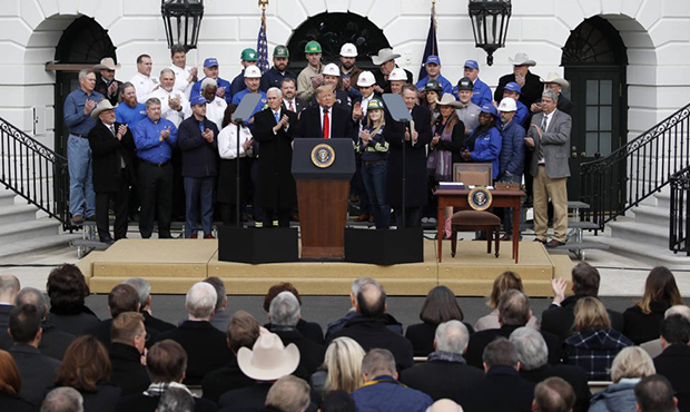 President Donald Trump speaks during an event at the White House to sign a new North American trade...