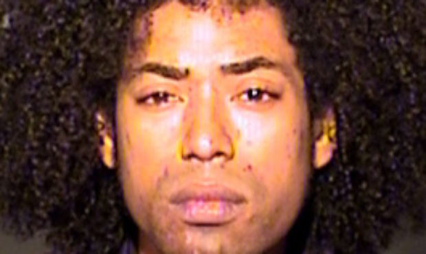 (Jordan Taylor mugshot provided by the Chandler Police Department)...