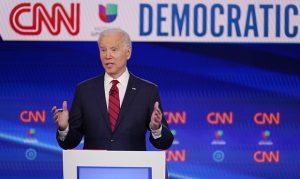 Biden commits to picking woman as running mate if he wins nomination