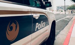 Man found dead with gunshot injury in parked car in Phoenix