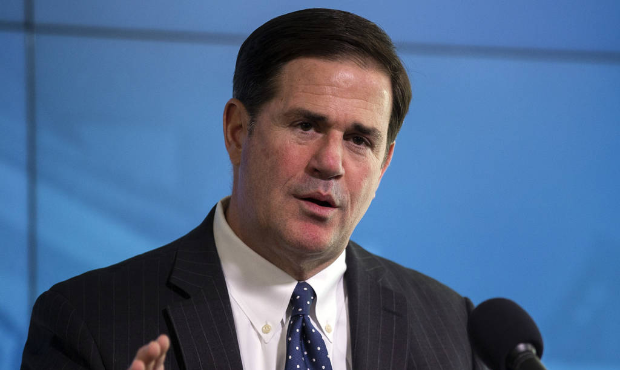 Gov. Doug Ducey speaks during a news conference about extending his statewide stay-at-home order, W...